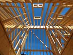 Looking up a to the Passiv Haus rafters of timber frame construction